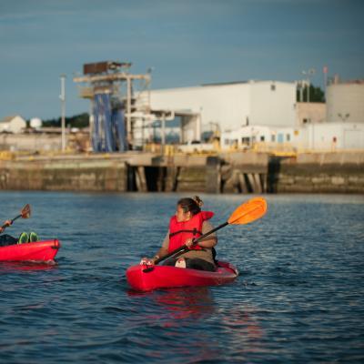 two people kayak on the Chelsea Creek
